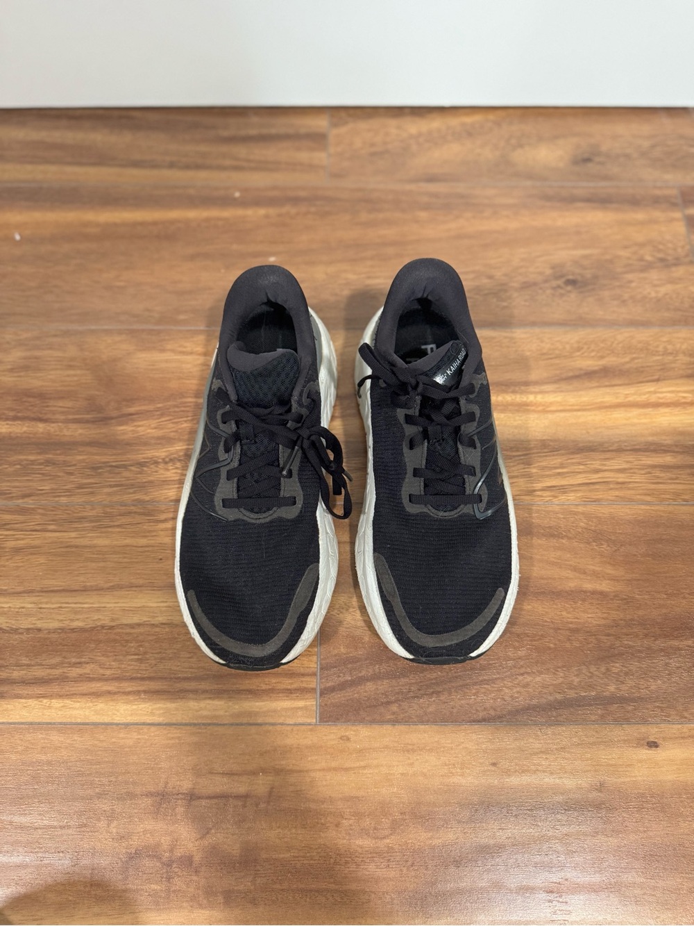 New Balance Women's Black and White Sneakers